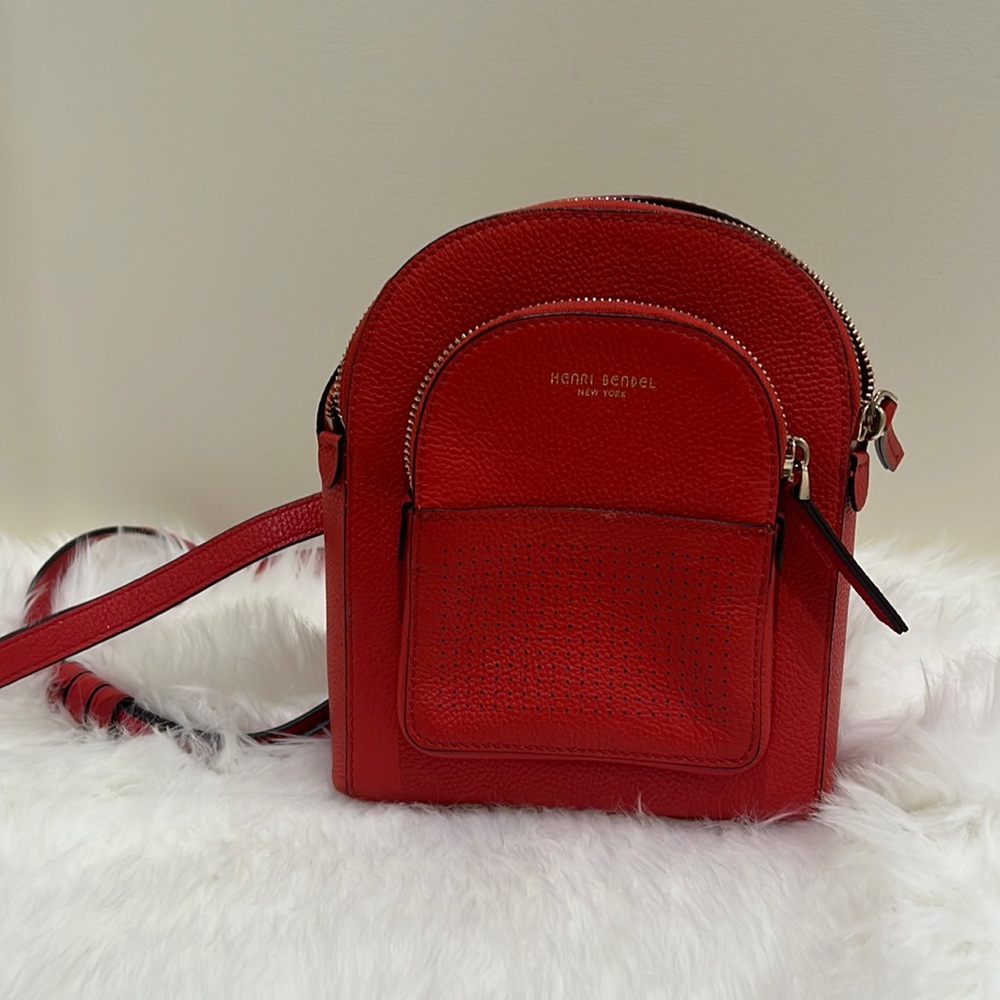 Red Henri Bendel backpack